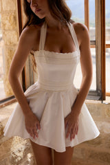 white broderie anglais + cotton halter neck mini dress